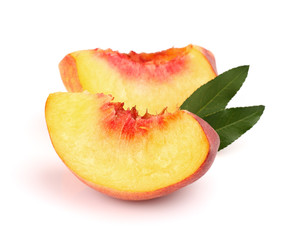 Slices of peach with leaves