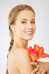 Fototapeta premium lovely woman with lily flower