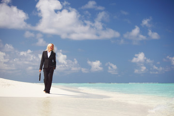 business woman on the ocean coast