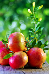 Ripe Pomegranates on table
