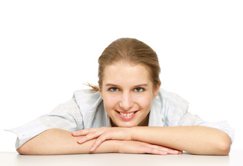 Fototapeta premium A young college girl sitting at the desk