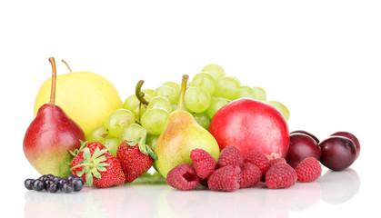 Mix of ripe sweet fruits and berries isolated on white