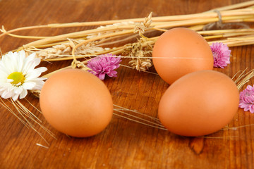 Boiled eggs on wooden background