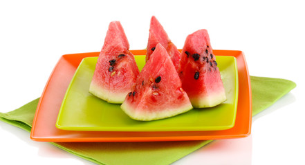 Sweet watermelon slices on plates isolated on white