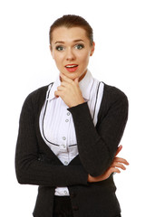 A portrait of a surprised businesswoman on white background