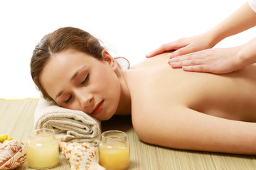 Fototapeta na wymiar An attractive young woman receiving massage
