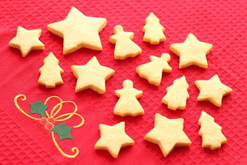 Christmas cookies on red christmas cloth