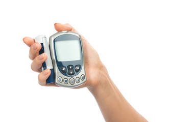 glucometer in hand for measuring glucose level blood test