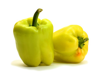 fresh green bell peppers isolated on white