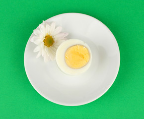 Boiled egg on color background