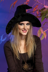 Fototapeta premium Halloween witch on gray background