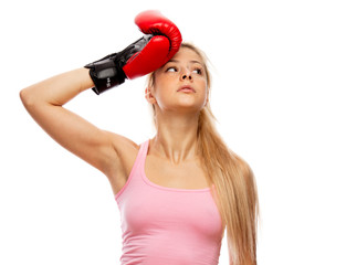 Tired woman with boxer gloves