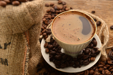Coffee beans and cup