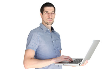 A portrait of attractive young man holding a laptop
