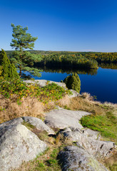 Fototapeta na wymiar Vertical autumn lake landscape from Swedish hill