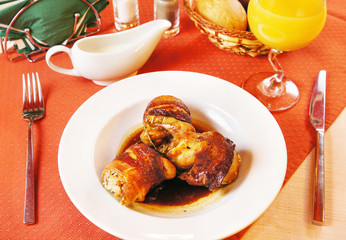 Quails stuffed with rice on a dish