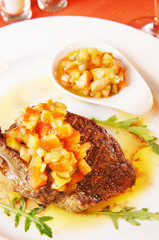 Veal with vinaigrette on a plate