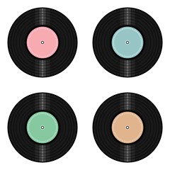 four vinyl records on white background