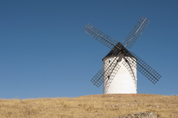 Fototapeta na wymiar White ancient windmill