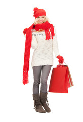 young girl with shopping bags