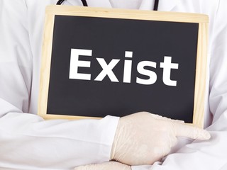 Doctor shows information on blackboard: exist