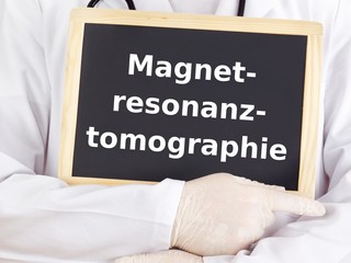 Doctor shows information: magnetic resonance imaging