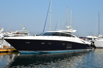 Motor yacht over harbor pier, Odessa, Ukraine