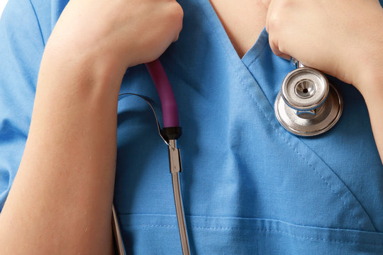 Close-up image of stethoscope and medical uniform
