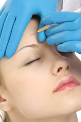 A cosmetic injection of botox to the face