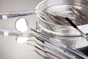 Set of dental tools for teeth care isolated on grey background