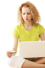 Portrait of a smiling business woman with a laptop