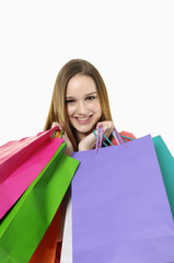 happy shopping girl holding bags