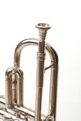 silver trumpet on a white background