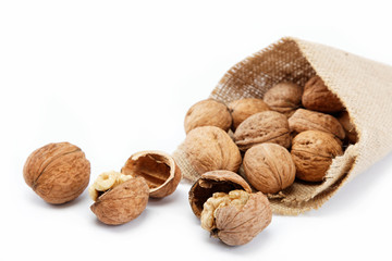 Walnut in a bag on a white background