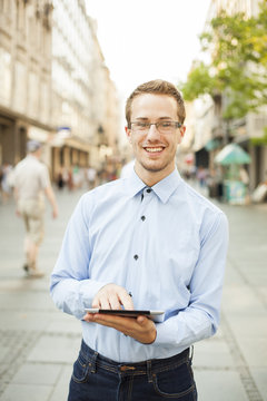 Man With Tablet Computer on street