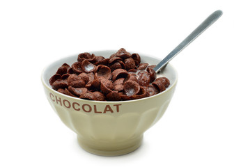 Bowl with chocolate cornflakes, cereals and milk