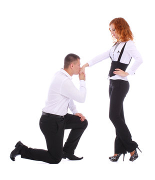 Young Man Proposing To A Woman While Standing On One Knee