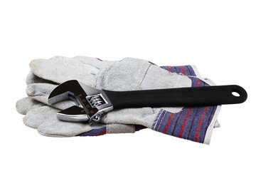 adjustable spanner with gloves isolated on white