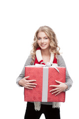 young smiling woman holding christmas gift