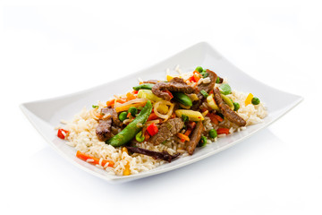 Roasted meat, white rice and vegetables