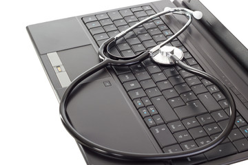 Stethoscope lying on the keyboard
