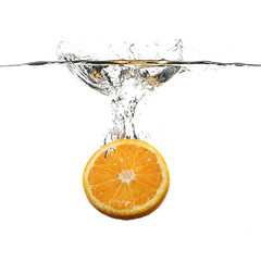 Obraz na płótnie Canvas orange with water splash on white