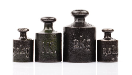 old weight pieces isolated on white