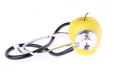stethoscope and yellow apple isolated on white, concept