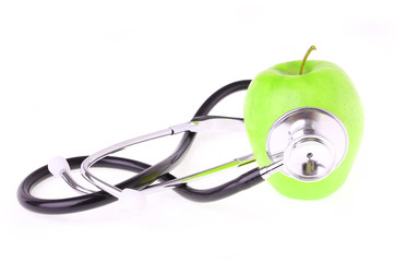 stethoscope and green apple isolated on white