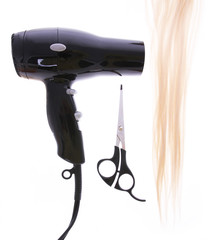 hair dryer, scissors and lock of hair isolated