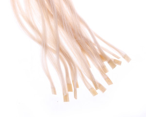 keratin capsules of blonde hair extensions isolated