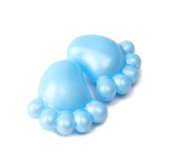 blue bare feet candles for baby shower isolated on white