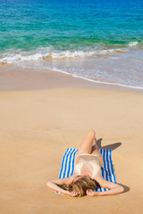 Beautiful Woman Relaxing on Tropical Beach