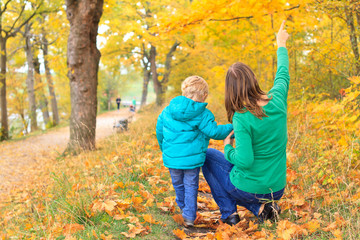 Fototapeta premium family walk in autumn